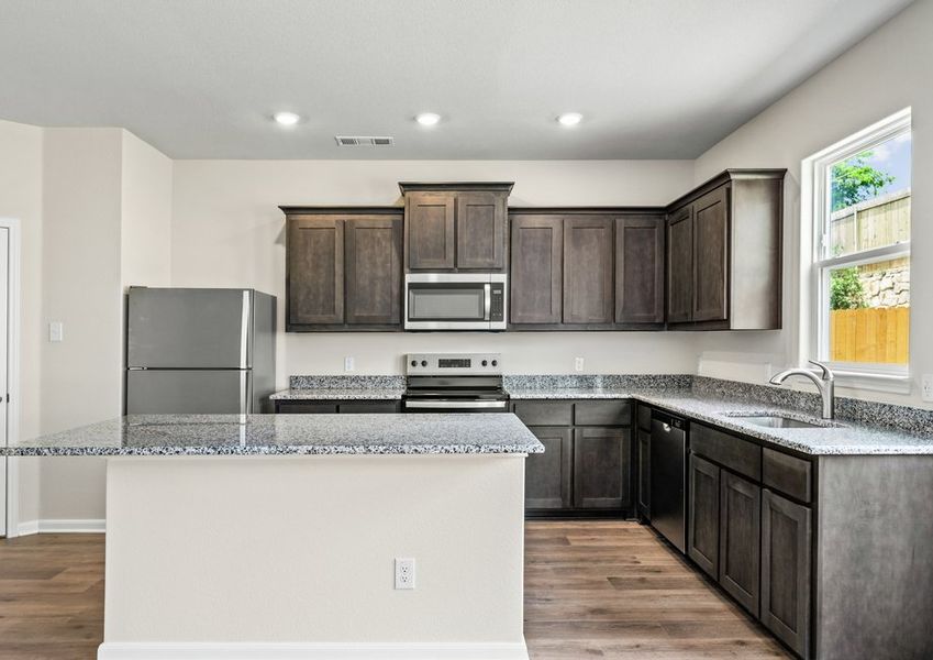 The chef-ready kitchen has upgraded fixtures and features.