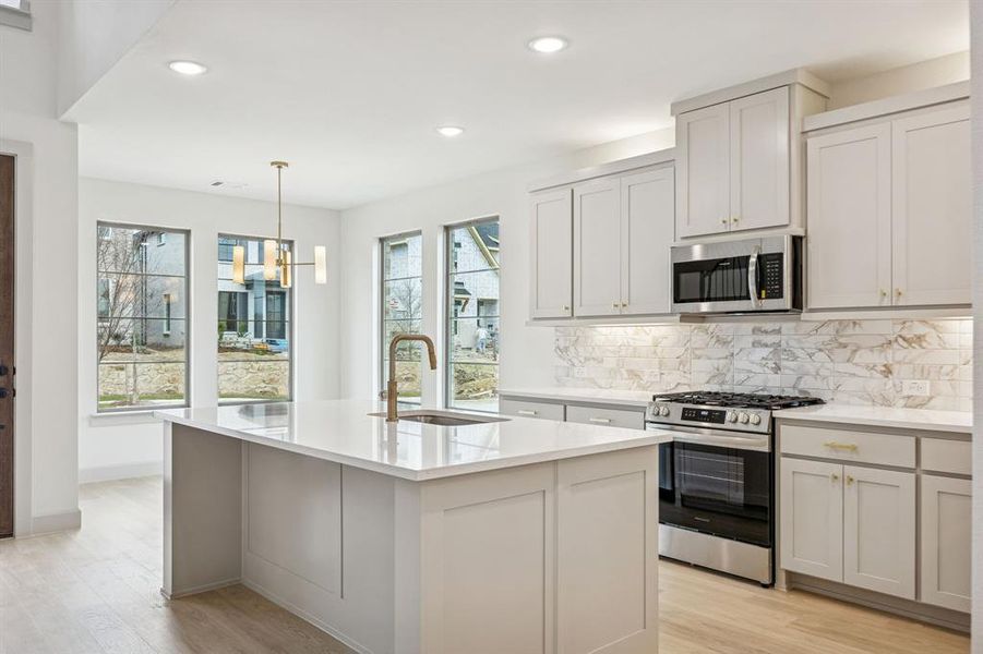 Open and light filled, this dream kitchen is the perfect place to host family and friends.