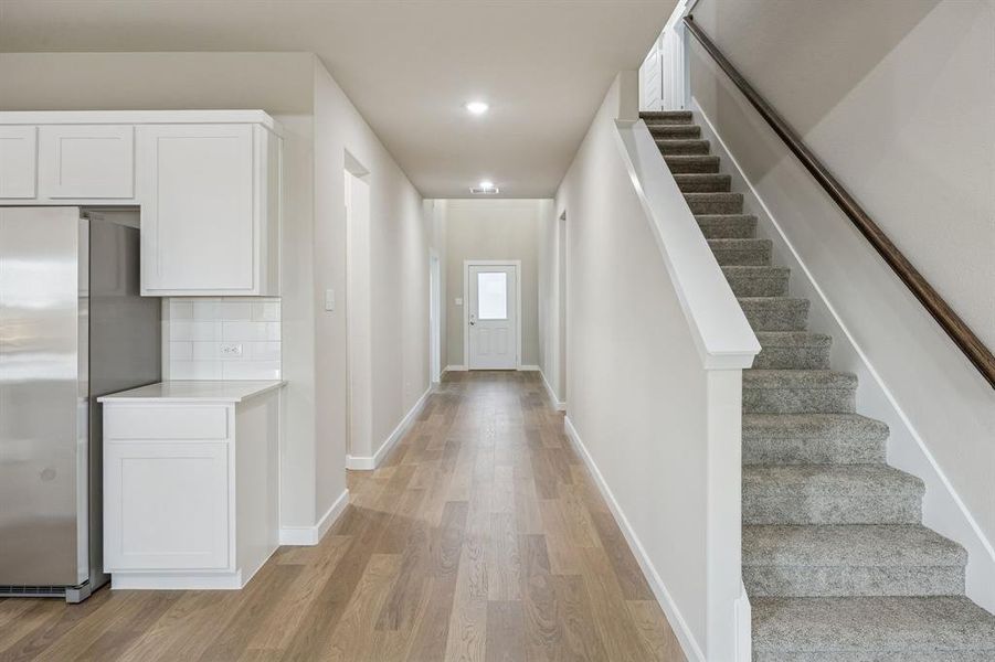 Entryway in the Wimbledon home plan by Trophy Signature Homes – REPRESENTATIVE PHOTO Entryway in the Wimbledon home plan by Trophy Signature Homes – REPRESENTATIVE PHOTO