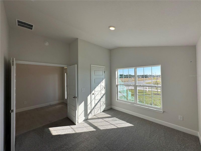 Spacious, unfurnished interior of a new home in Densan Park, Wildwood (Image 13).