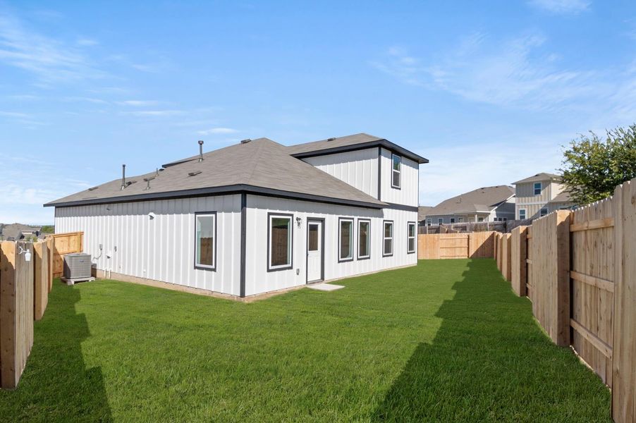 Exterior details and patio area of a home in Cloverleaf, Austin (Image 3).