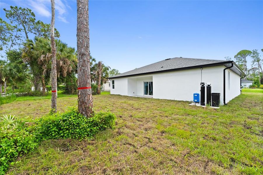Exterior details and patio area of a home in , North Port (Image 22).