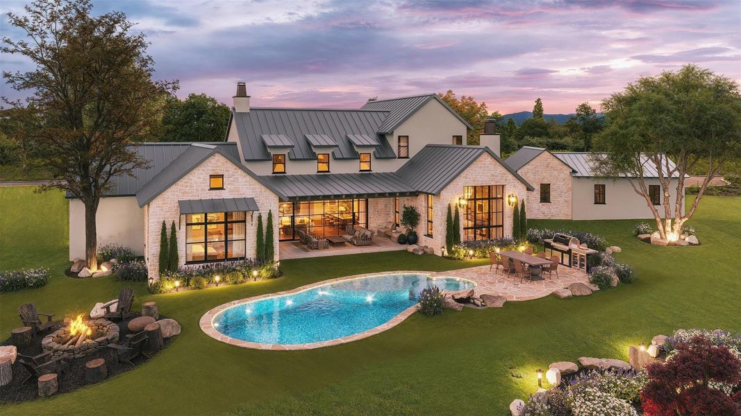 Back of property at dusk with a fire pit, a patio, a chimney, and a yard Back of property at dusk with a fire pit, a patio, a chimney, and a yard