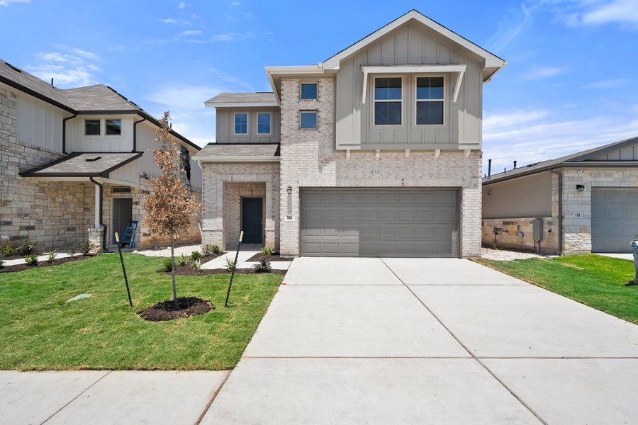 Front exterior of a new home in Crosswinds, Kyle, TX, highlighting curb appeal (Image 23). Front exterior of a new home in Crosswinds, Kyle, TX, highlighting curb appeal (Image 23).