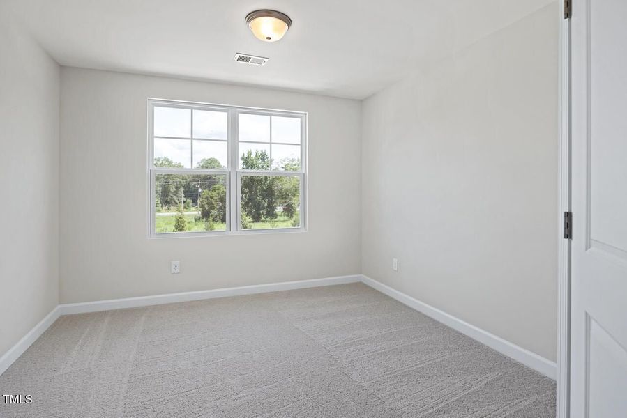 Spacious, unfurnished interior of a new home in Springvale, Fuquay Varina (Image 18).