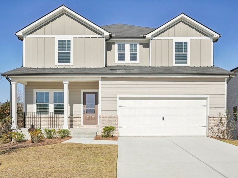 Front exterior of a new home in Ivey Township, Dallas, GA, highlighting curb appeal (Image 1).