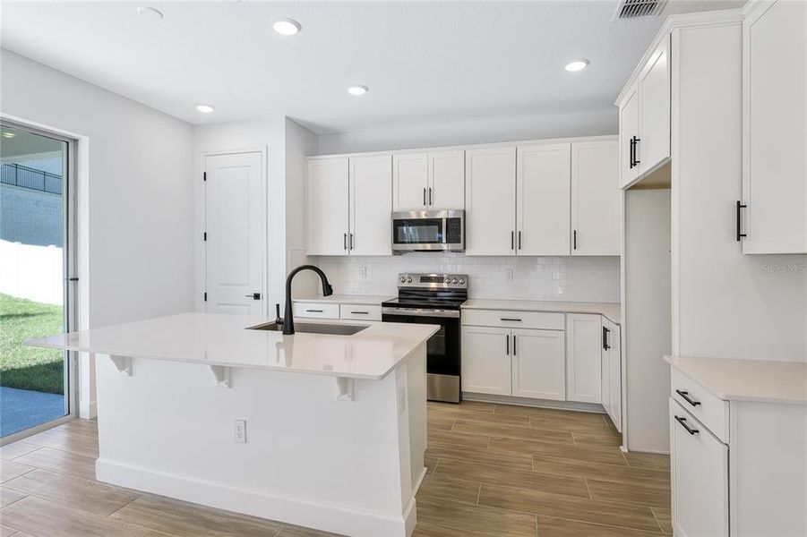 Furnished interior view inside a new home in Seasons at Wekiva Ridge, Mount Dora (Image 6). Furnished interior view inside a new home in Seasons at Wekiva Ridge, Mount Dora (Image 6).
