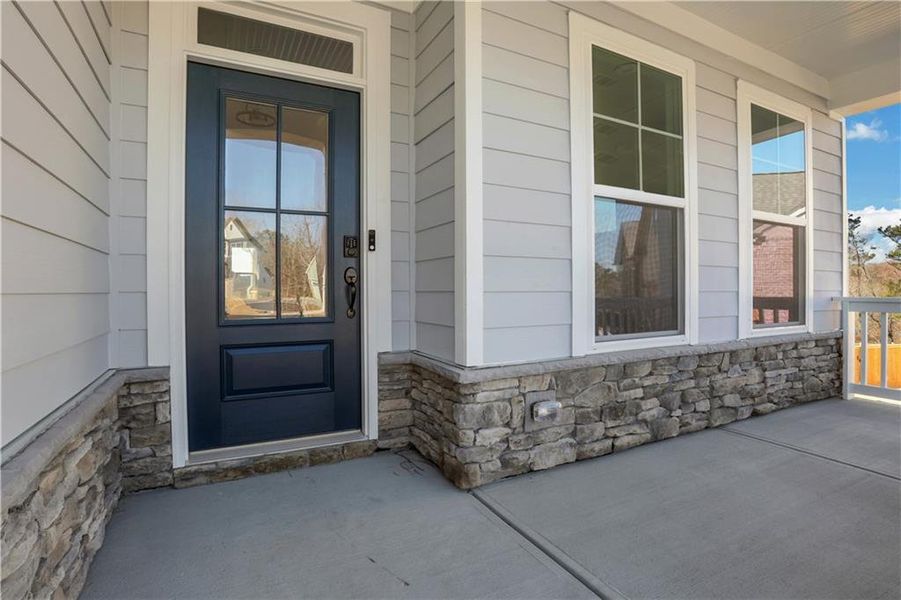 Exterior details and patio area of a home in Cambridge, Flowery Branch (Image 23).