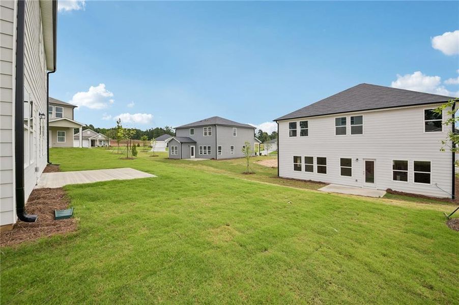 Exterior details and patio area of a home in Northwoods at Mirror Lake, Villa Rica (Image 4).