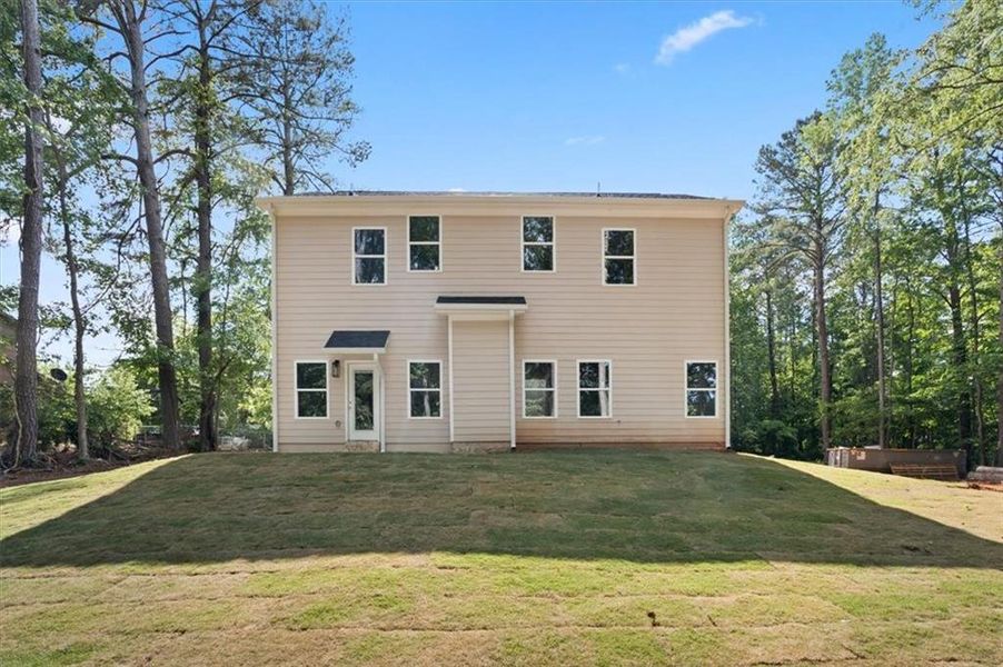 Front exterior of a new home in , Ellenwood, GA, highlighting curb appeal (Image 19).