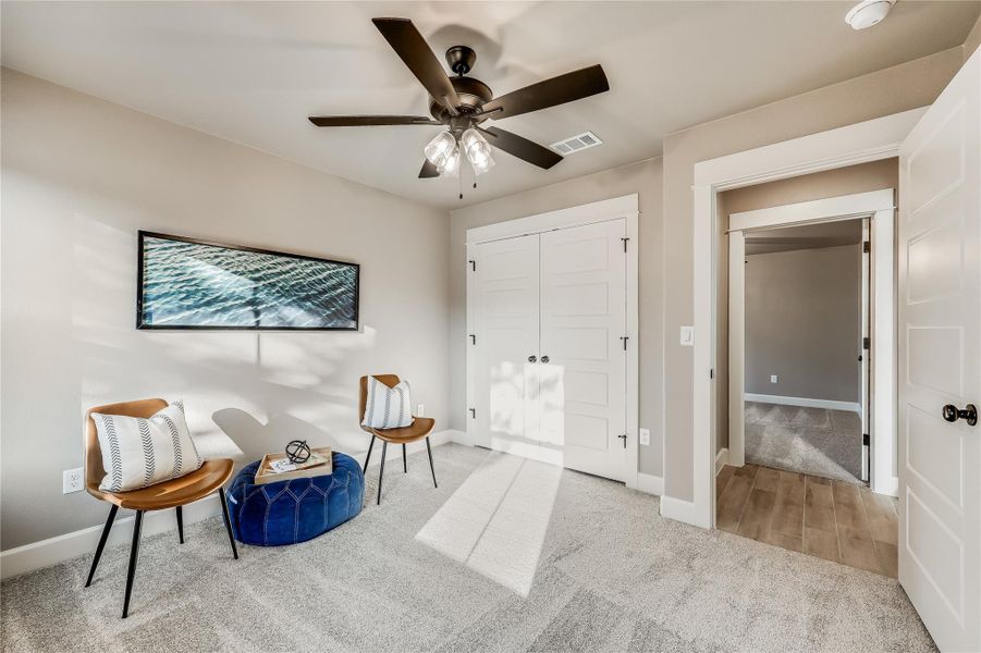 A tucked away secondary bedroom is perfect for a home office, creative room, or for a parent or teen