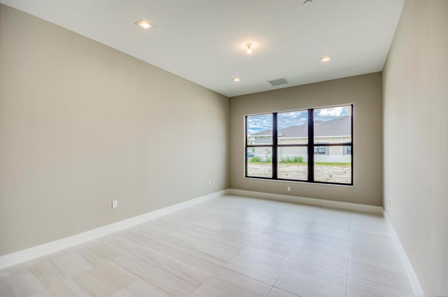 Furnished interior view inside a new home in Apex at Avenir, Palm Beach Gardens (Image 45).