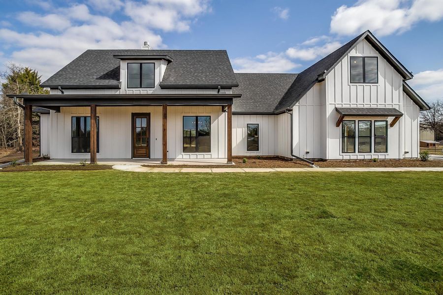 Representative exterior photo of a completed home built from the Erin by Trinity Classic Homes in The Reserve at Shadle, Poolville, TX (Image 1). Representative exterior photo of a completed home built from the Erin by Trinity Classic Homes in The Reserve at Shadle, Poolville, TX (Image 1).