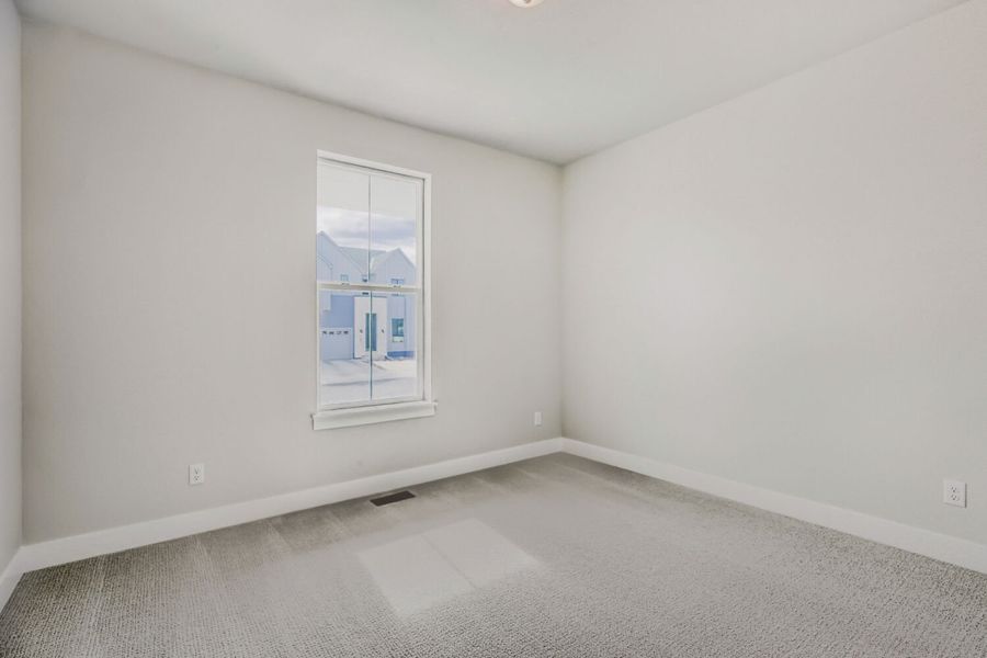 Spacious, unfurnished interior of a new home in RainDance, Windsor (Image 19).