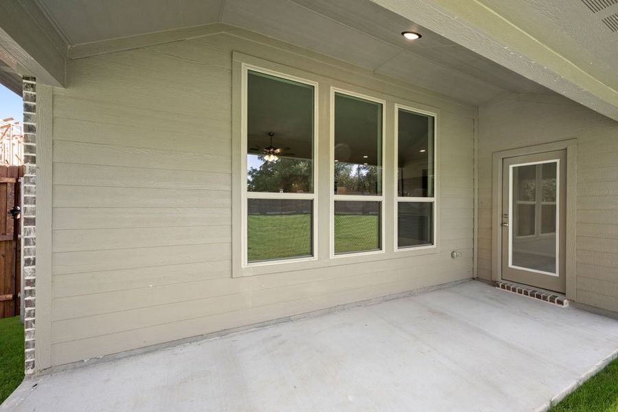 Front exterior of a new home in Stone Eagle, Azle, TX, highlighting curb appeal (Image 18). Front exterior of a new home in Stone Eagle, Azle, TX, highlighting curb appeal (Image 18).