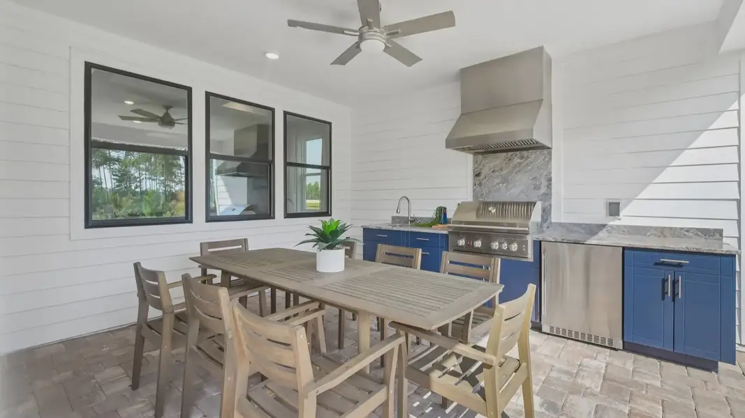Outdoor Summer Kitchen and Sitting Area in the Marigold Floor Plan