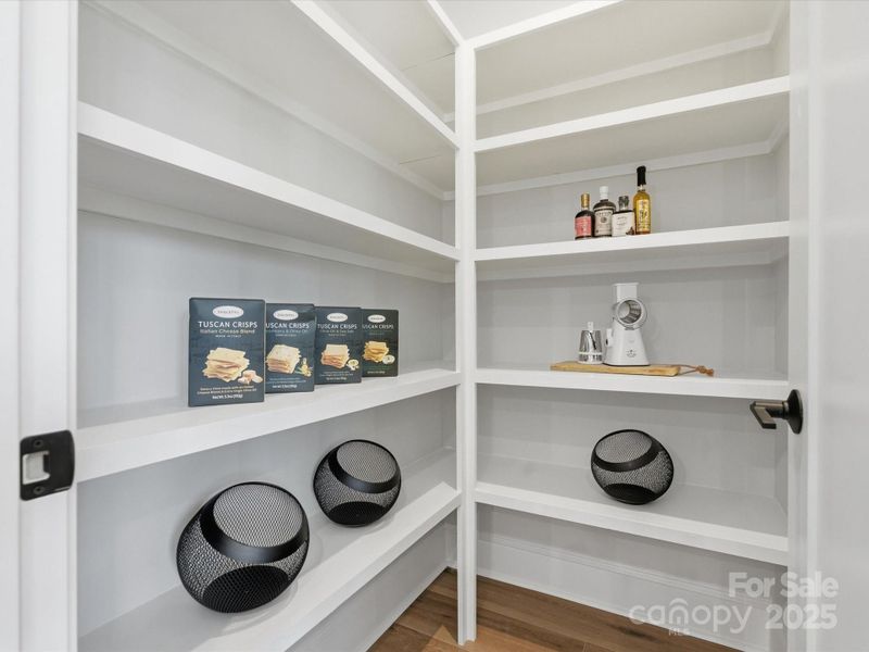 Walk-In Pantry with Durable Shelving. *Model Photos | Actual Finishes, Structural Selections, and Orientation May Vary.