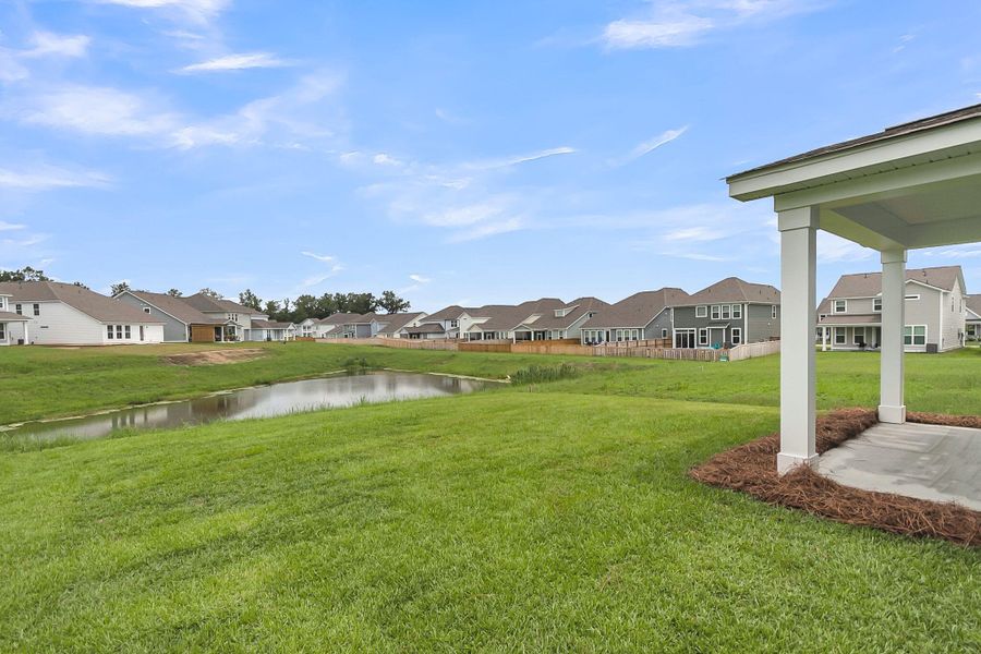 Front exterior of a new home in High Point at Foxbank, Moncks Corner, SC, highlighting curb appeal (Image 35).