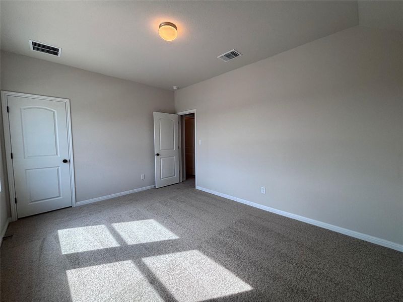 Spacious, unfurnished interior of a new home in The Colony 50s, Bastrop (Image 10).