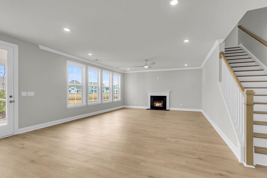 Spacious, unfurnished interior of a new home in Tidewater at Lakes of Cane Bay, Summerville (Image 52).