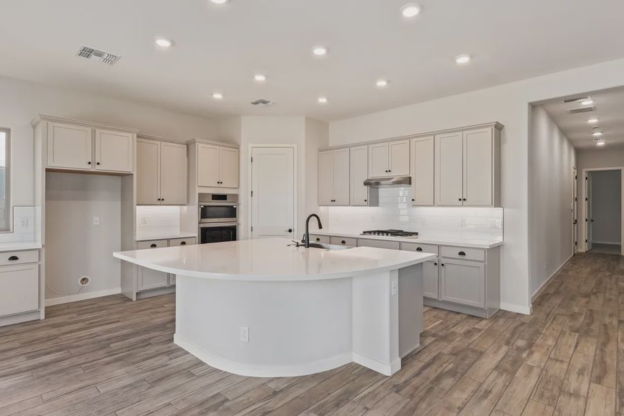 Furnished interior view inside a new home in Valencia at Granite Vista, Waddell (Image 7).