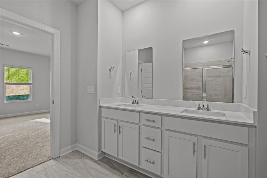 Furnished interior view inside a new home in The Farm at Wells Creek - Signature Collection, Gray Court (Image 9).