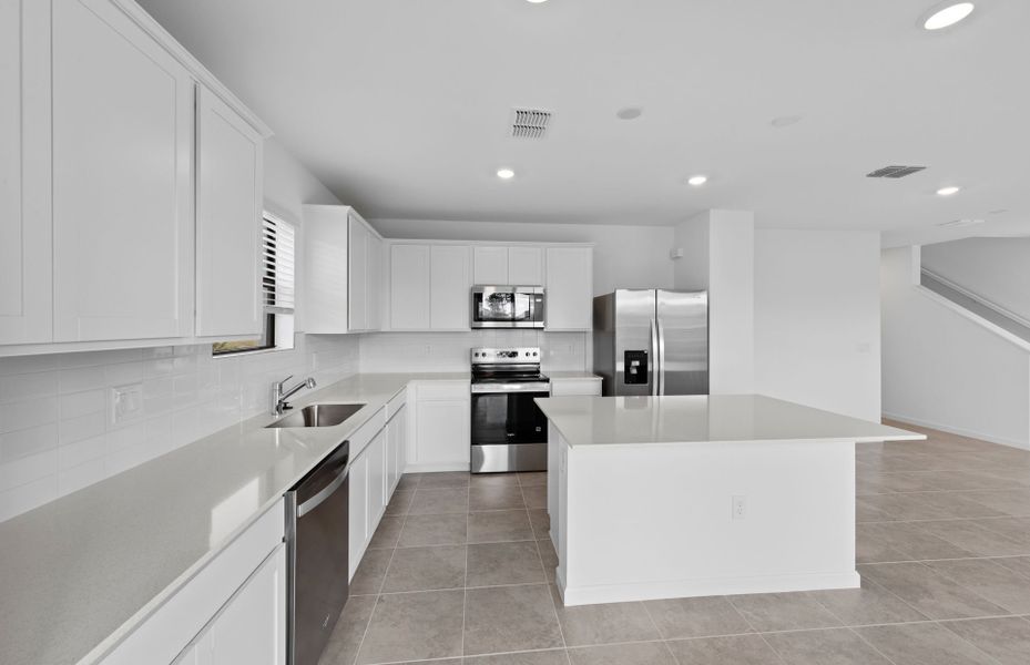 Furnished interior view inside a new home in Caloosa Cove, Labelle (Image 10).