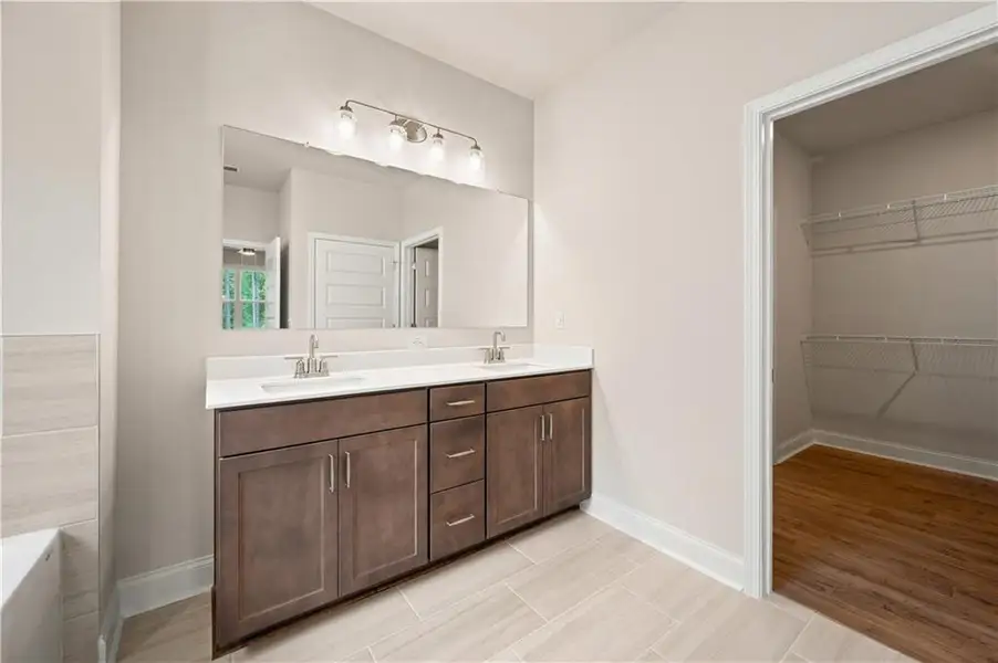 Furnished interior view inside a new home in Oak Ridge Meadows - Active Adult, Locust Grove (Image 7).