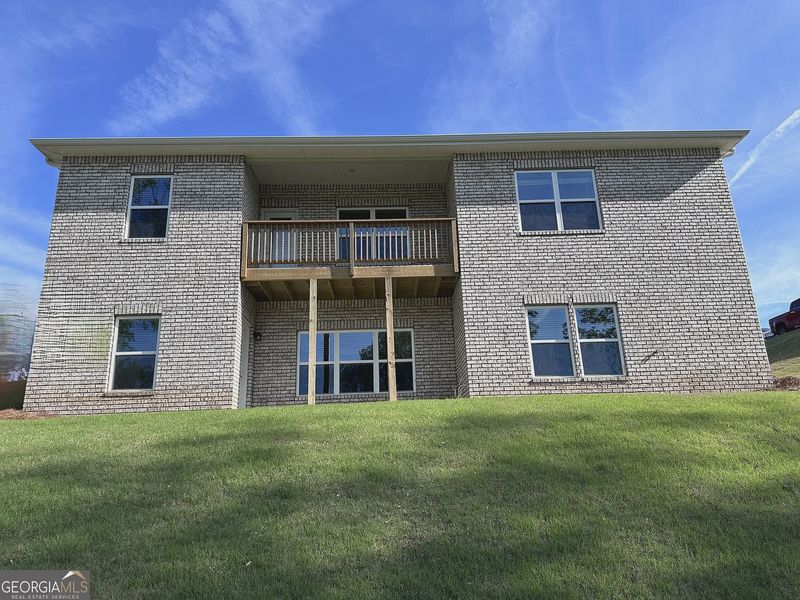 Exterior details and patio area of a home in Oakview Estates, Macon (Image 3).