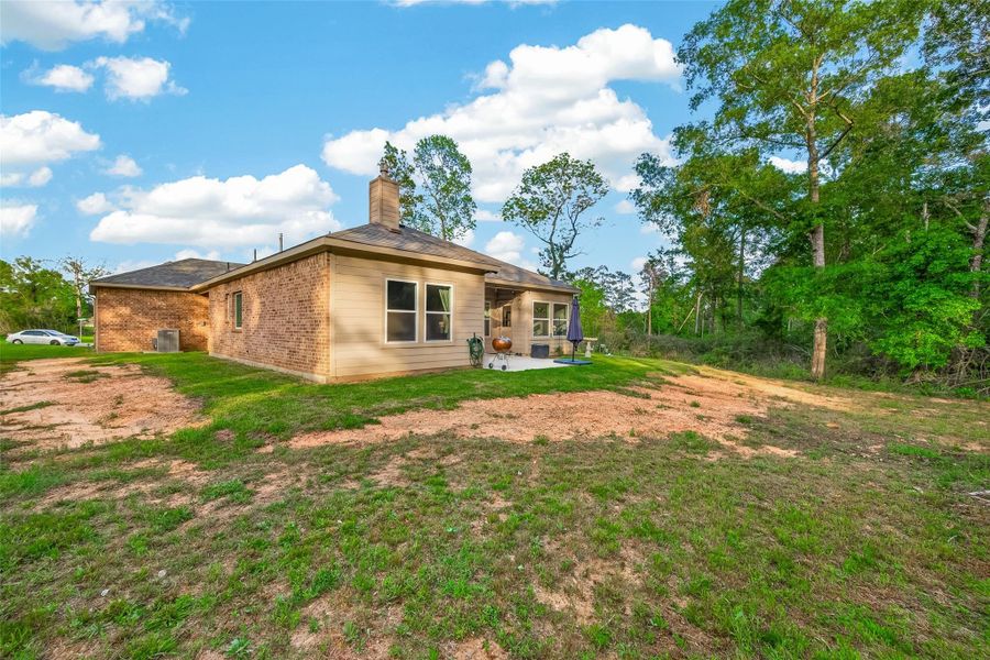 Exterior details and patio area of a home in , Willis (Image 23).
