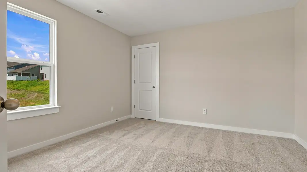 Separate secondary room with window and closet
