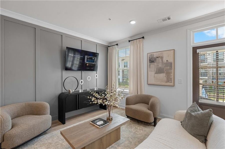 Living Room with South Facing Windows & 9 Ft Ceilings *Images shown are from a decorated model of the same floor plan. Design selections and color packages will vary by home.*