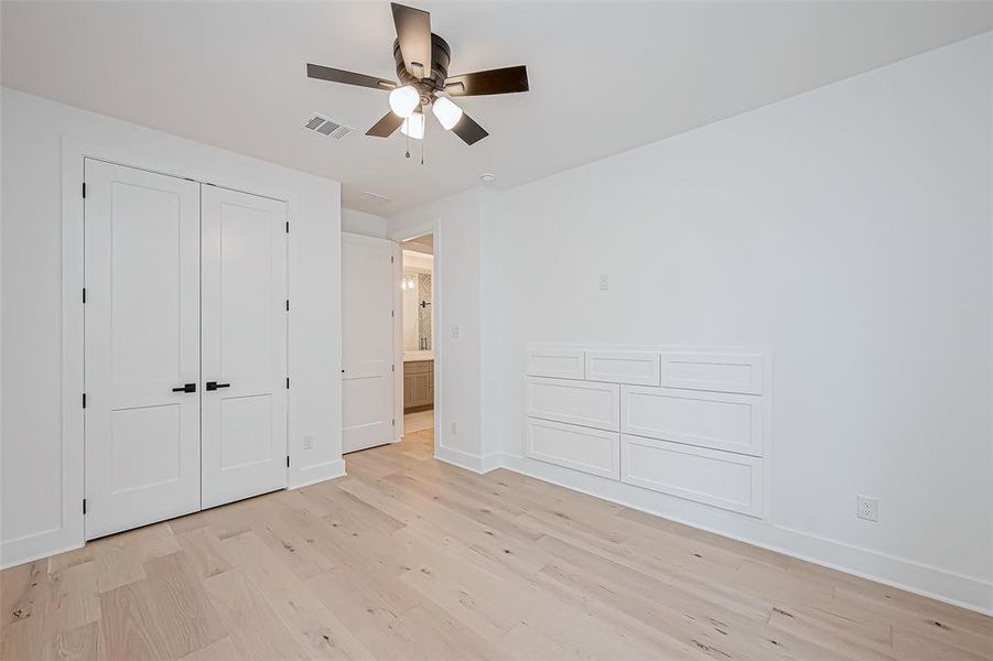 Secondary DOWNSTAIRS bedroom with built-in storage