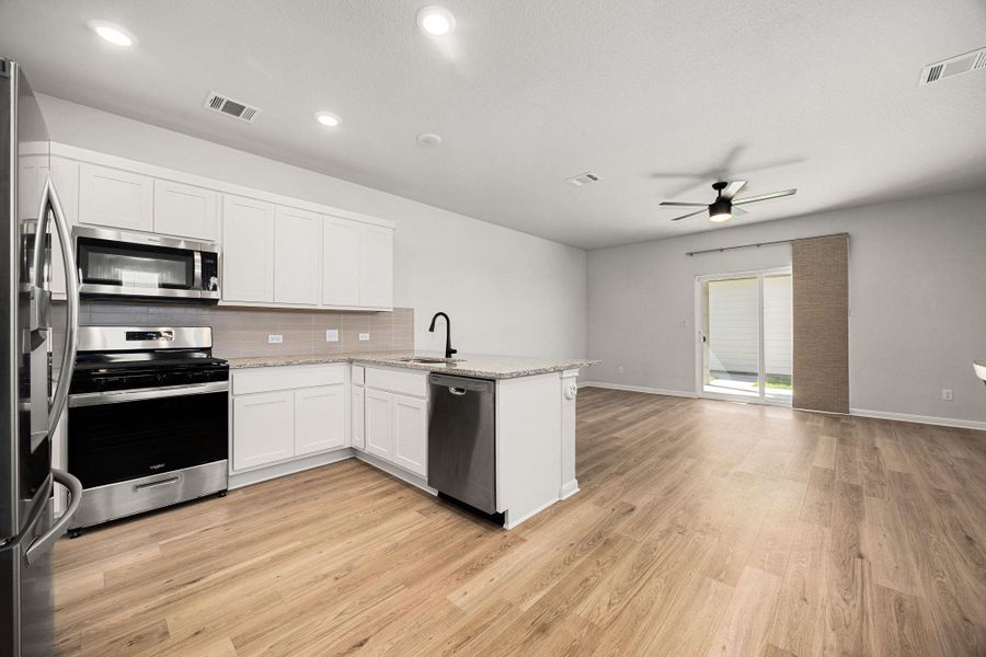 Furnished interior view inside a new home in , Round Rock (Image 13).