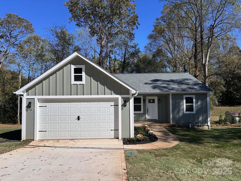 Front exterior of a new home in , Hickory, NC, highlighting curb appeal (Image 20).