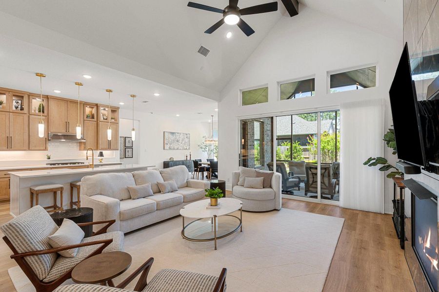 The expansive gliding doors extend the living space outdoors.