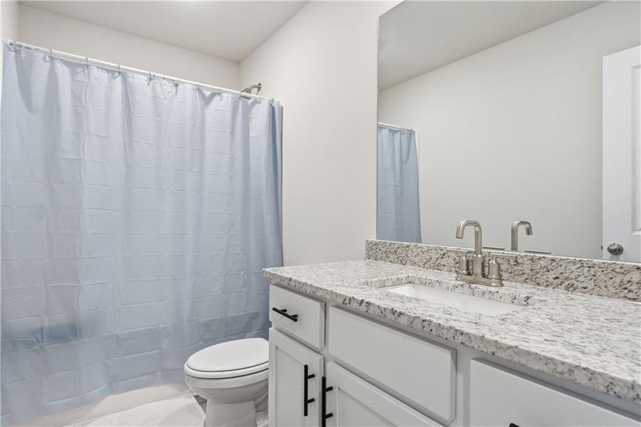 Furnished interior view inside a new home in , Oakwood (Image 16). Furnished interior view inside a new home in , Oakwood (Image 16).
