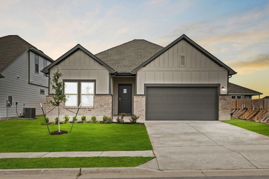 Front exterior of a new home in Westridge Cove, Conroe, TX, highlighting curb appeal (Image 1). Front exterior of a new home in Westridge Cove, Conroe, TX, highlighting curb appeal (Image 1).