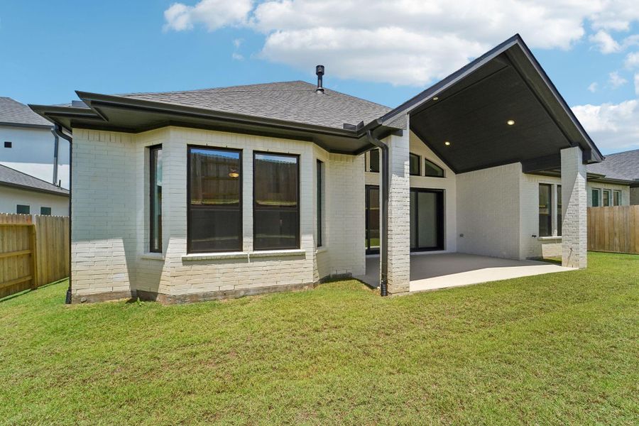 Exterior details and patio area of a home in WILDTREE 60', Montgomery (Image 3). Exterior details and patio area of a home in WILDTREE 60', Montgomery (Image 3).