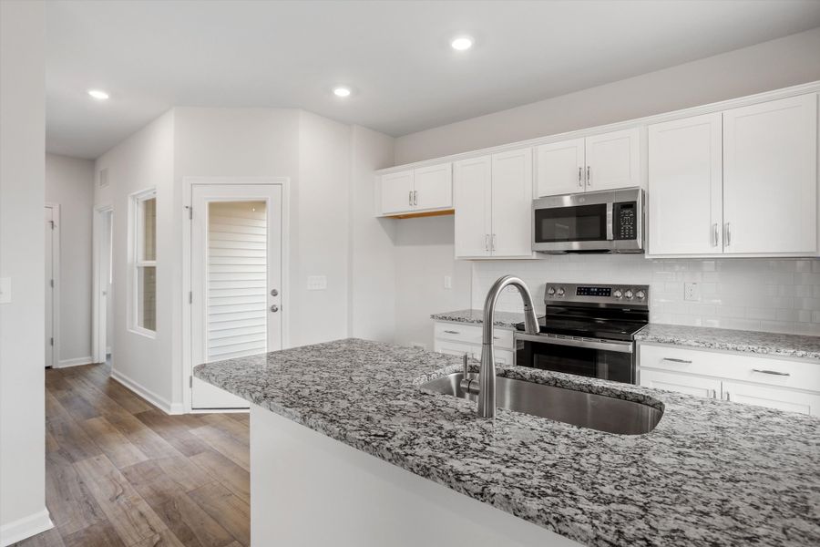 Furnished interior view inside a new home in Cambridge Reserve, Angier (Image 9).