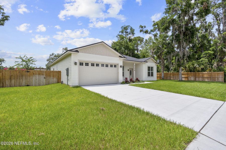 Front exterior of a new home in , Orange Park, FL, highlighting curb appeal (Image 25).