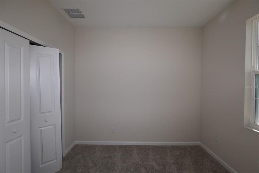 Spacious, unfurnished interior of a new home in Bay Lake Farms, St. Cloud (Image 21).