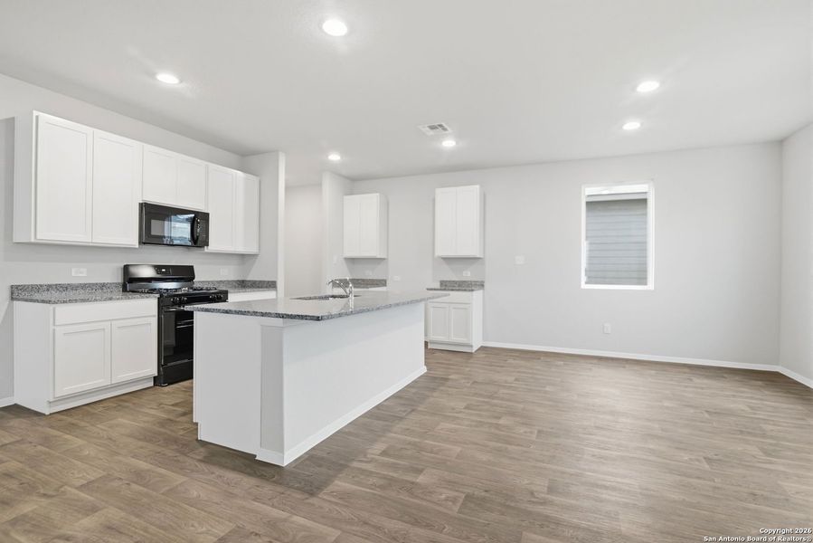 Furnished interior view inside a new home in Hunters Ranch, San Antonio (Image 9).