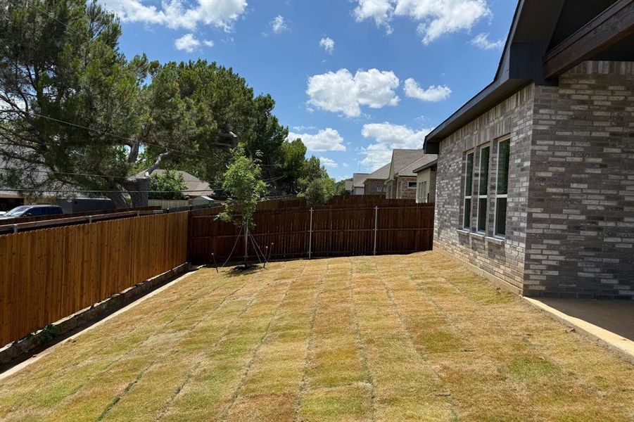 Exterior details and patio area of a home in Legacy Estates, Mansfield (Image 3).