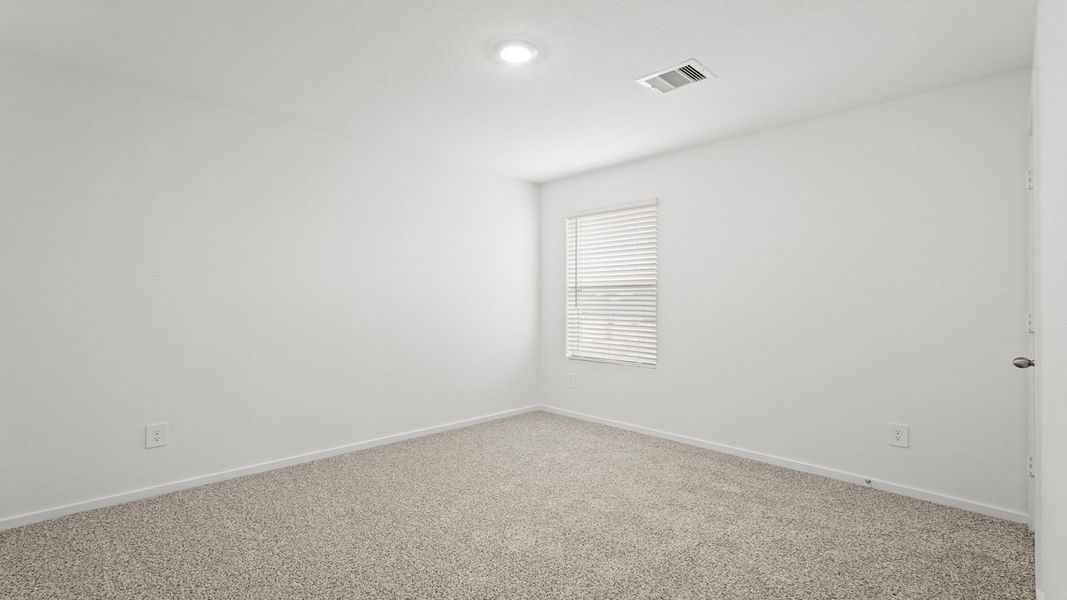 Spacious, unfurnished interior of a new home in Sunterra, Katy (Image 22).