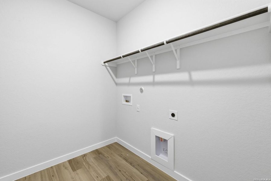 Spacious, unfurnished interior of a new home in The Meadows at Hunters Ranch, San Antonio (Image 32).