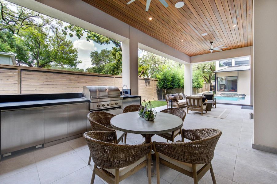 Outdoor kitchen and covered entertaining area.