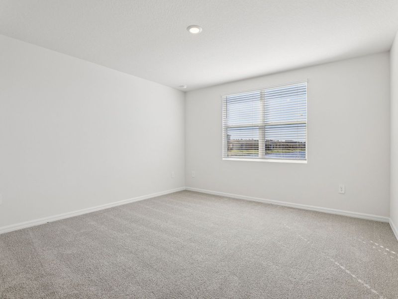 Spacious, unfurnished interior of a new home in Villamar - Signature Series, Winter Haven (Image 11).