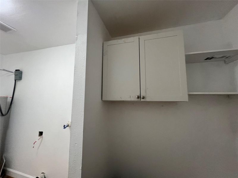 Cabinet storage space in utility Cabinet storage space in utility