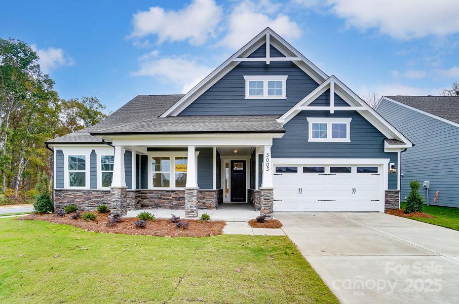 Homesite 12 features a Sullivan with elevation B, Ranch floorplan with front-load garage.